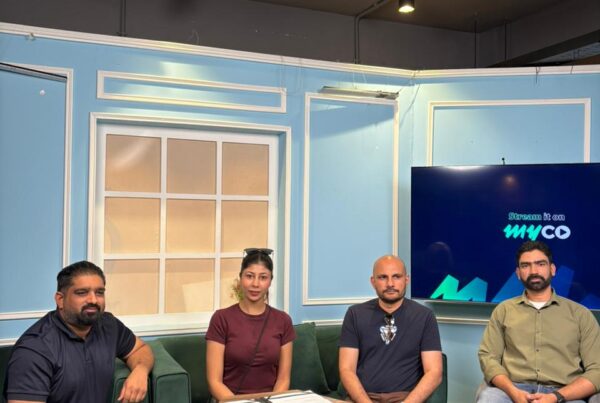 contract signing image showing partnership of myco with IoBM.